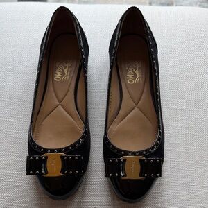 Salvatore Ferragamo Black Flats with Gold Accents and glitter details
